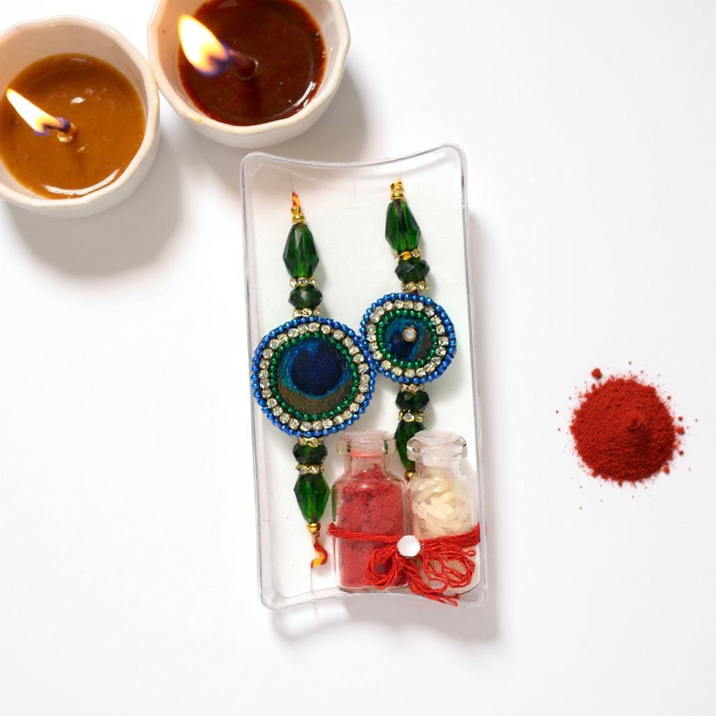 Handcrafted Peacock Feather Designer Rakhi Set of 2 with Kalava Thread, Roli & Akshat Vials thumbnail 6